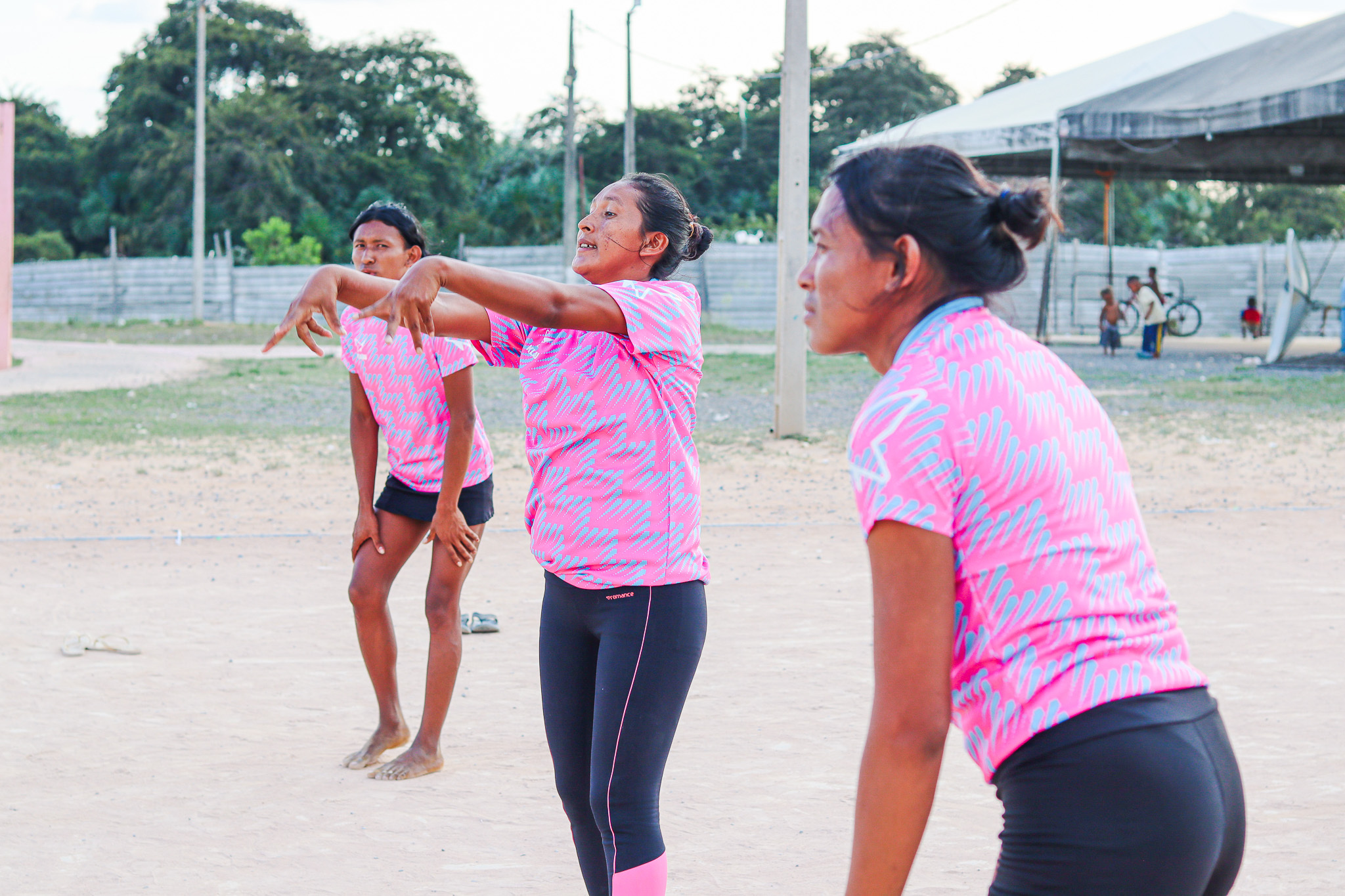 mauricela and paola playing volleyball together