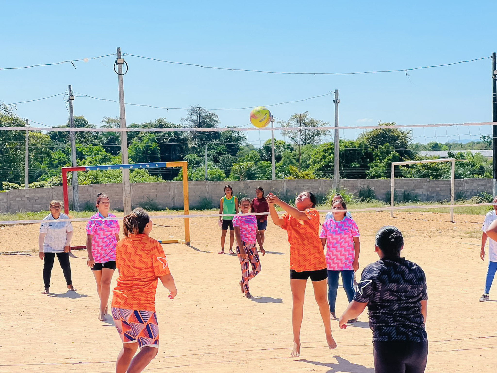 LGBTQ community playing volleyball