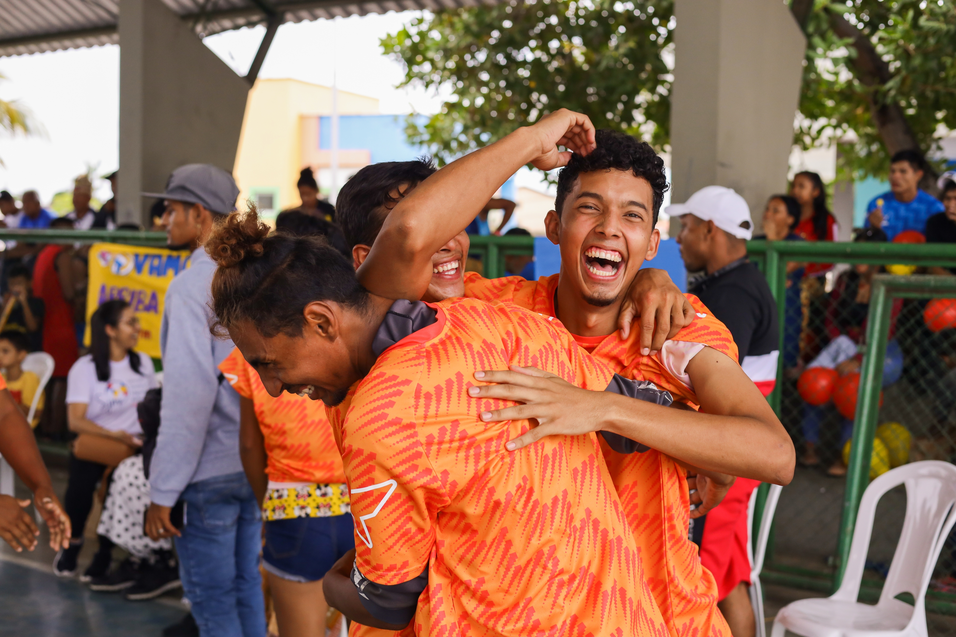 3 laughing kids having an good time