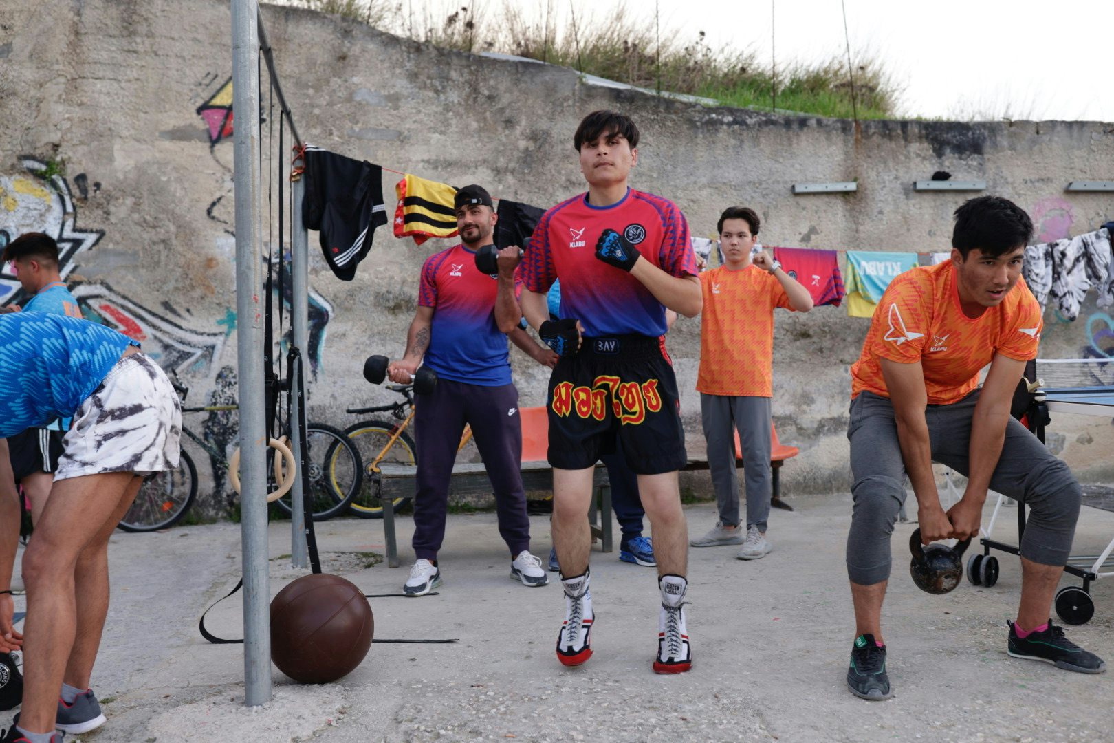 Klabu Clubhouse in Lesvos Greece with Refugees wearing el Seed and Klabu Teamwear