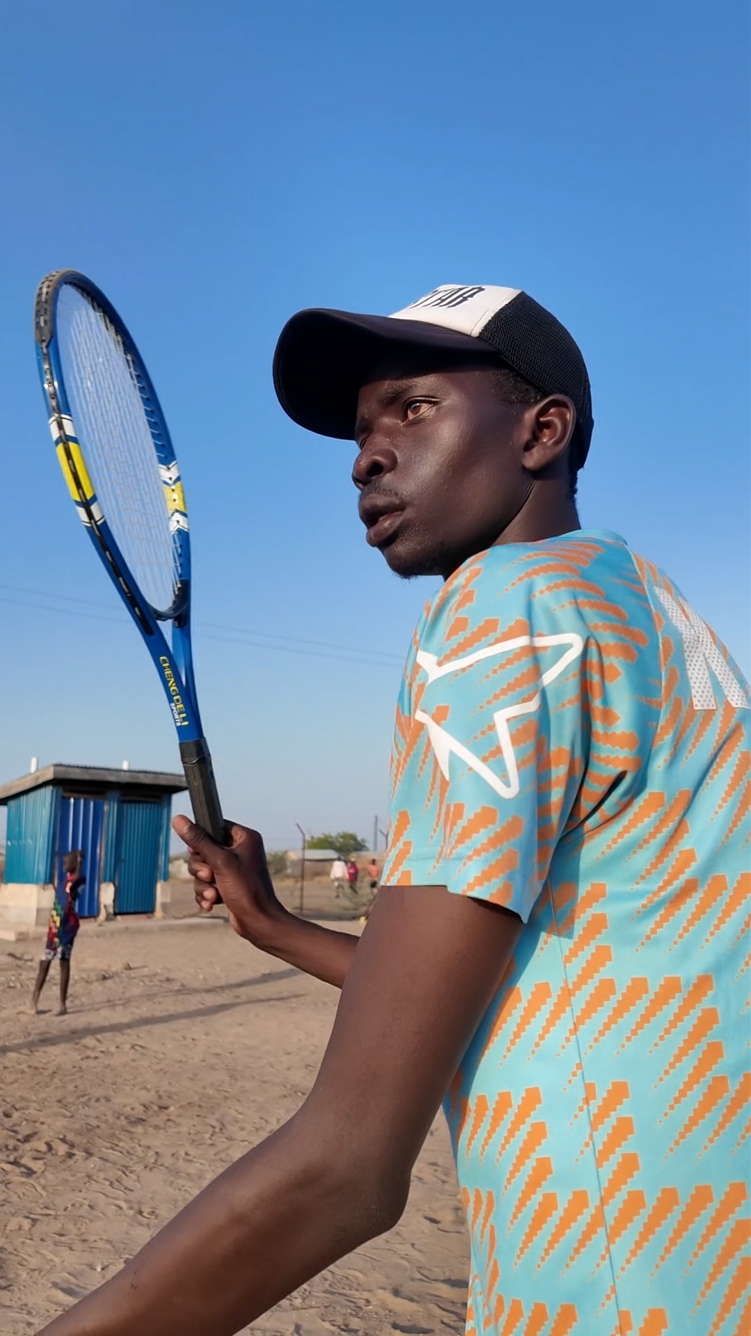 peter in kalobeyei tennis coach