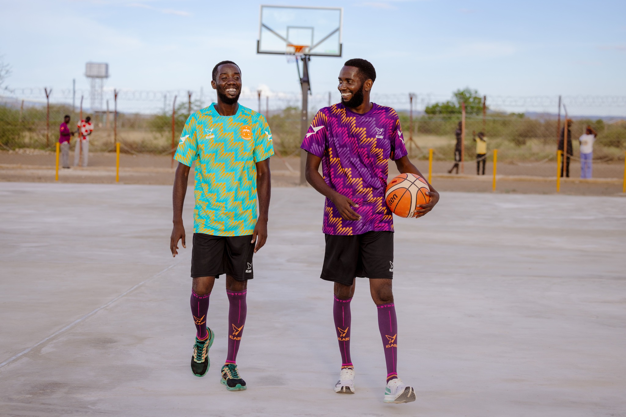 Brothers Emile & Dodi play basketball in Kalobeyei Refugee Settlement