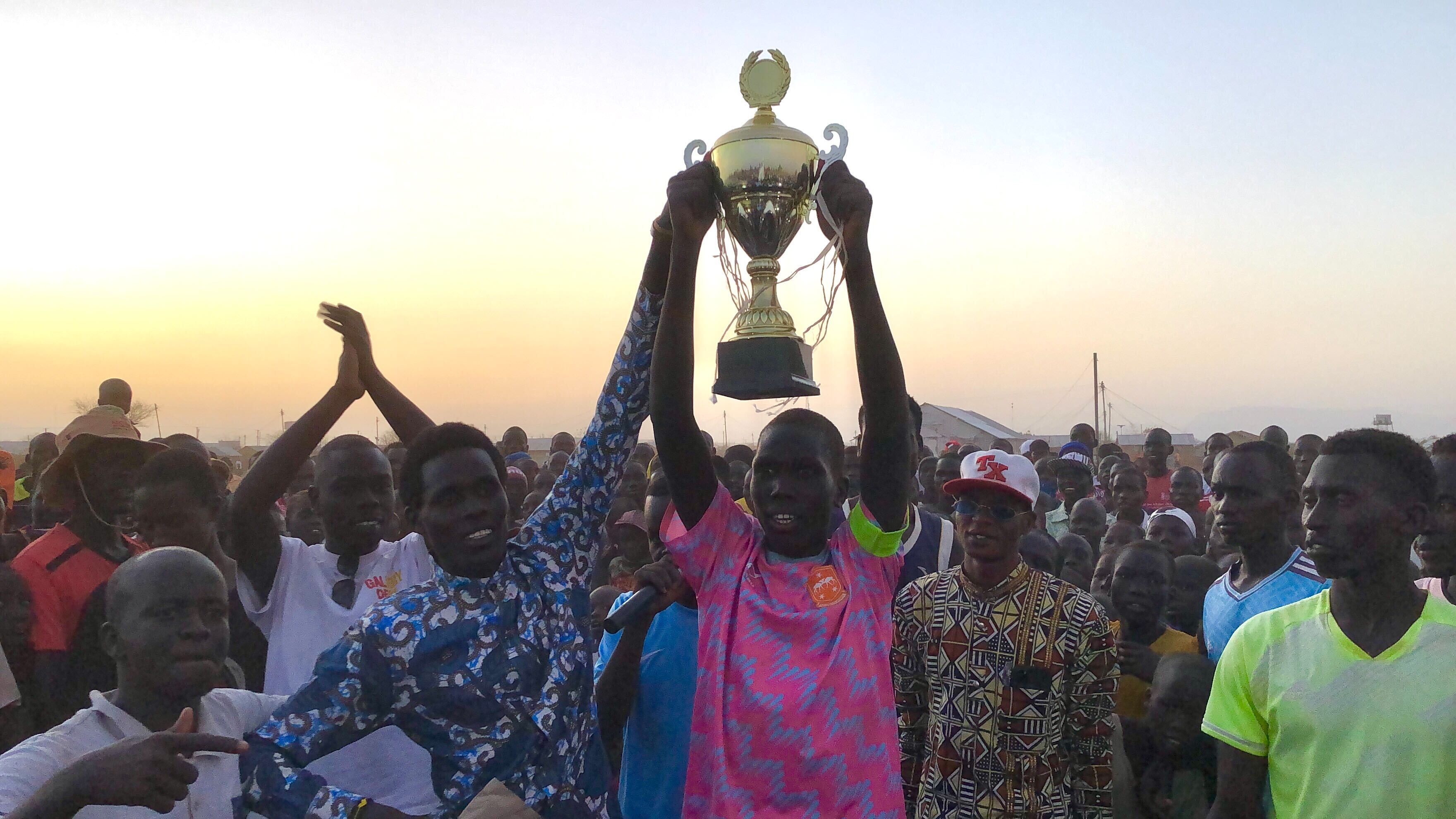 Player lifting trophy